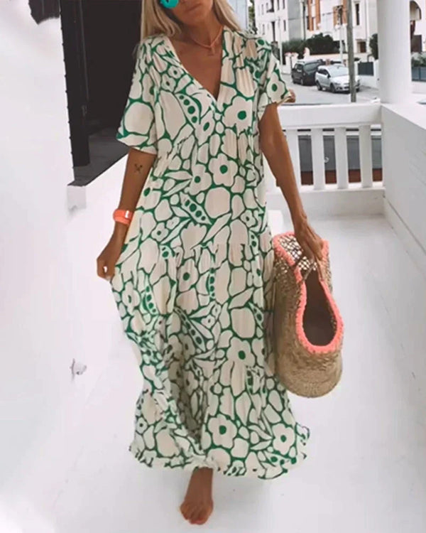 Christine – Flowing Floral Dress with Elegant V-Neckline